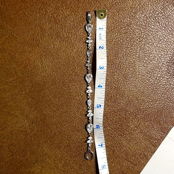 Givenchy silvertone and rhinestone tennis bracelet - Picture 6 of 7